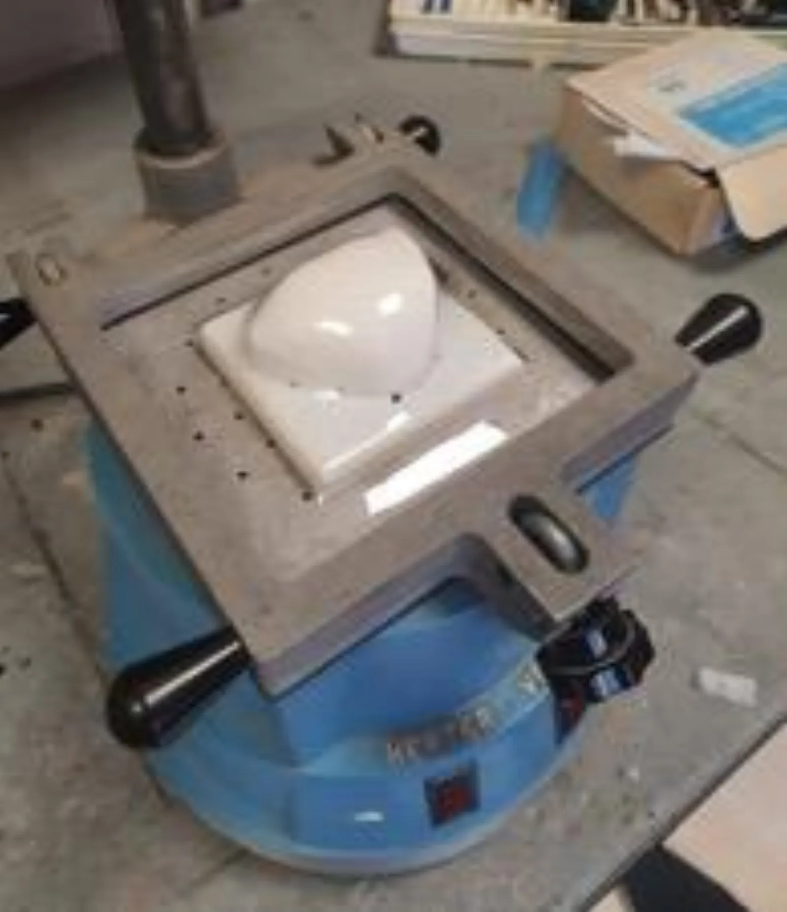 Vacuum forming the protective shell