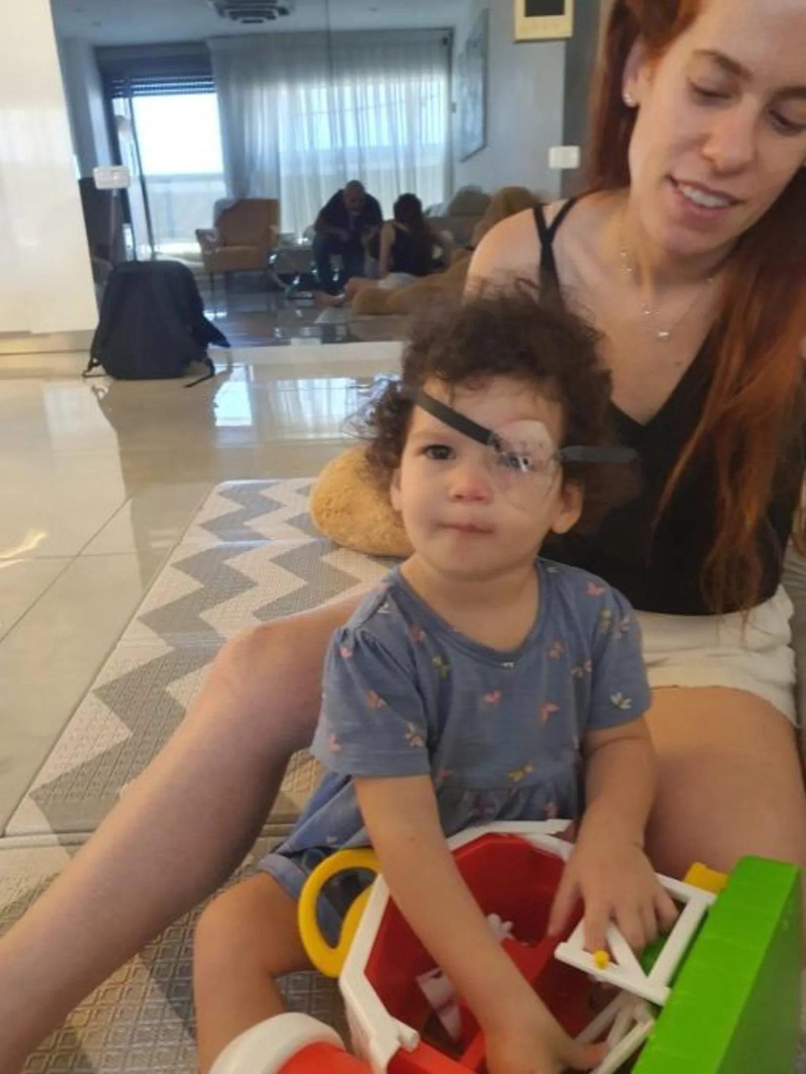 Romi wearing the custom 3D printed protective device